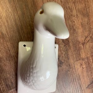Porcelain vintage duck head mount towel hanger.